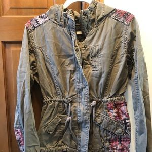 Green cargo jacket with colorful detailing